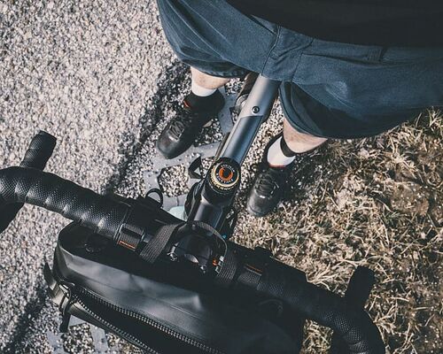 legs-cyclist-stand-road