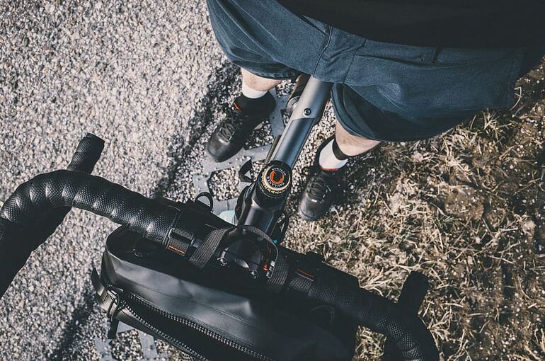 legs-cyclist-stand-road